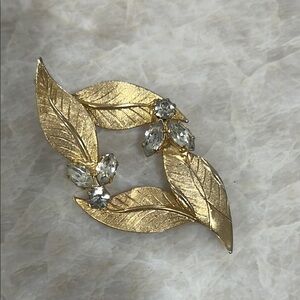 Elegant Gold Leaf Brooch with Silver Accents